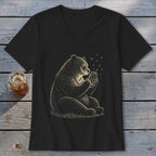 Black v-neck t-shirt with a drawing of a bear holding a jar of fireflies.