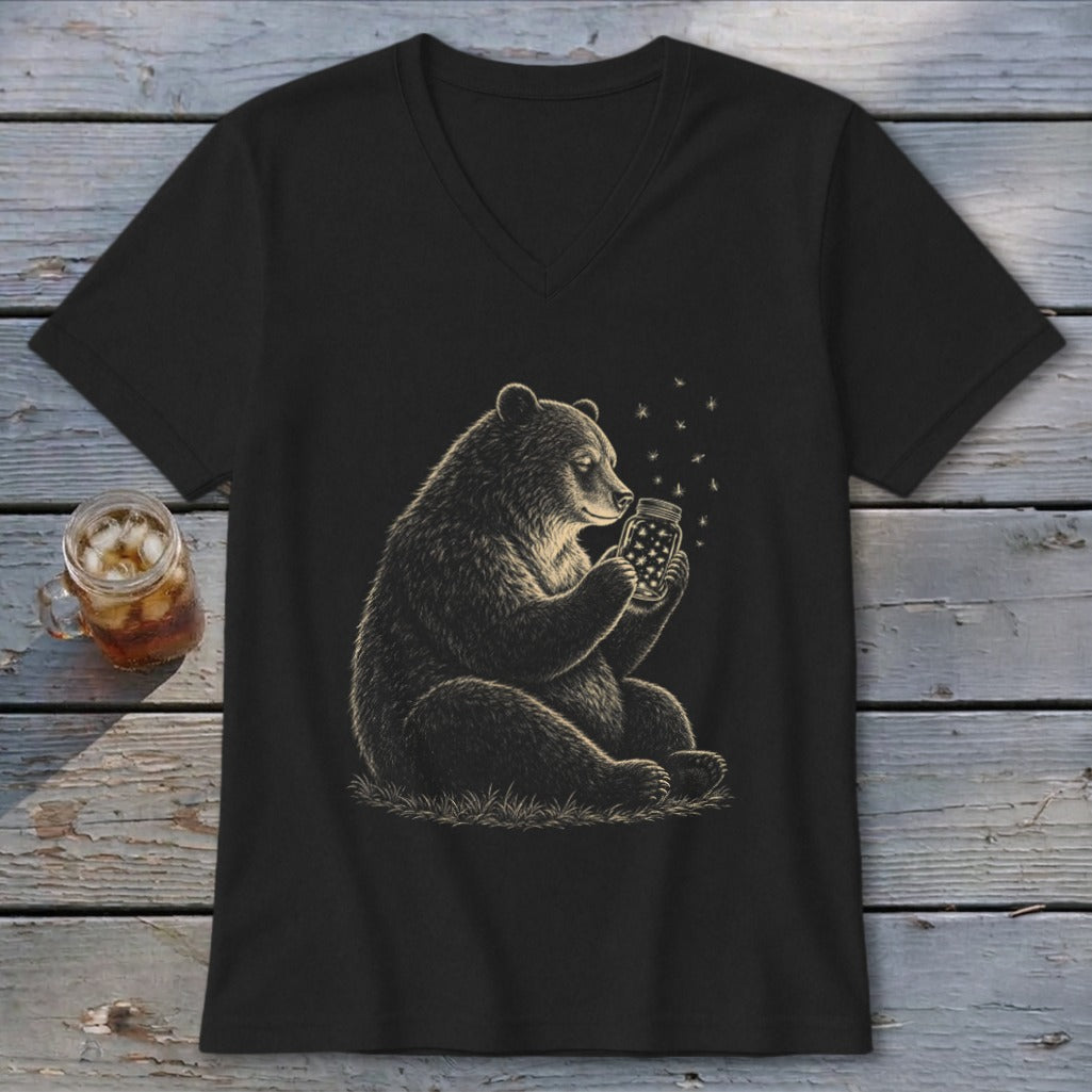 Black v-neck t-shirt with a drawing of a bear holding a jar of fireflies.