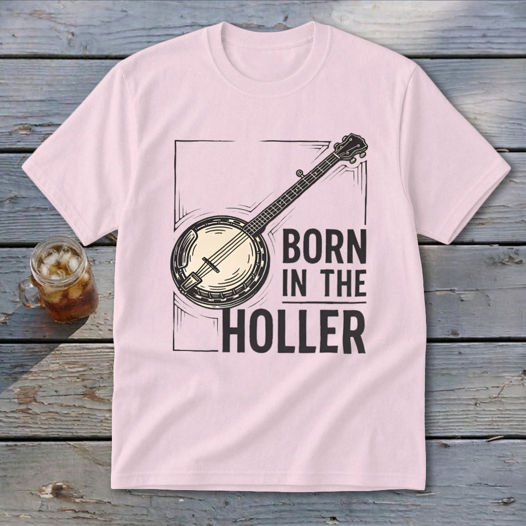 Light pink t-shirt with a banjo graphic and text "BORN IN THE HOLLER".