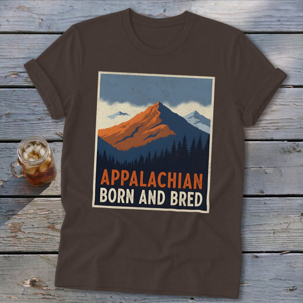 Brown t-shirt featuring a retro graphic of mountains and pine trees with the text Appalachian Born and Bred.