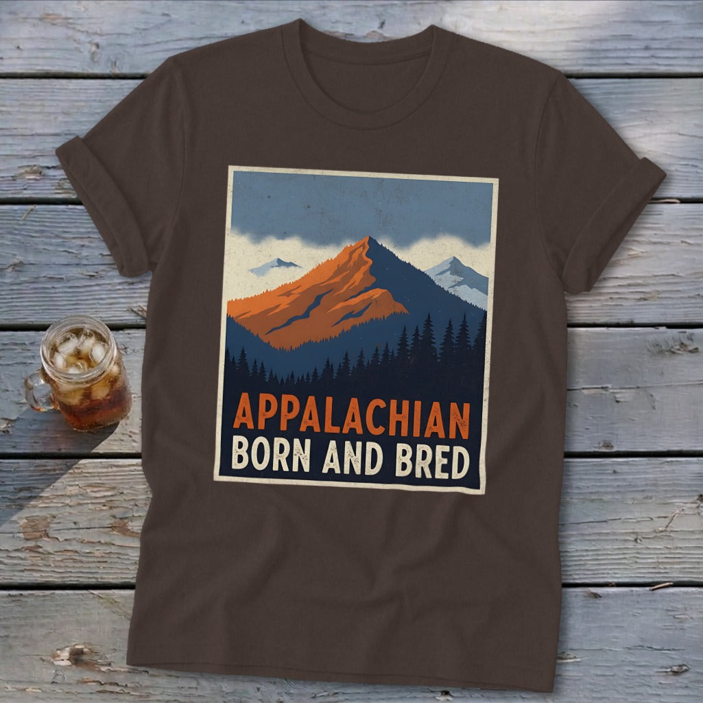 Brown t-shirt featuring a retro graphic of mountains and pine trees with the text Appalachian Born and Bred.