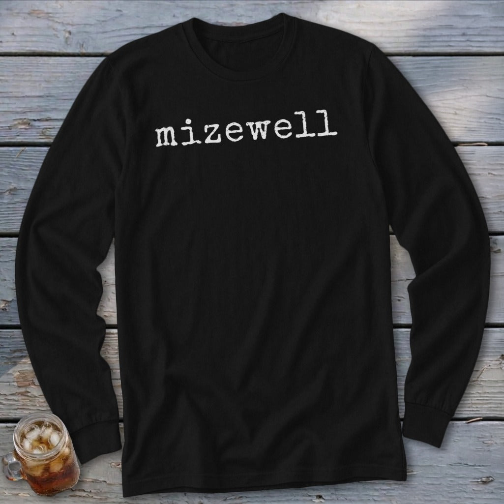 Black long sleeve shirt with "mizewell" in white typewriter font.