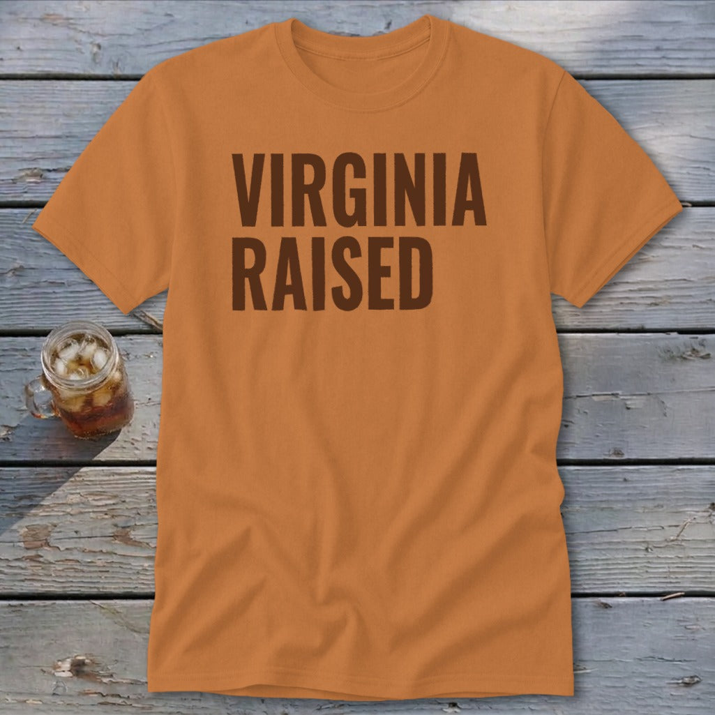 Orange t-shirt with "Virginia Raised" text in dark brown.