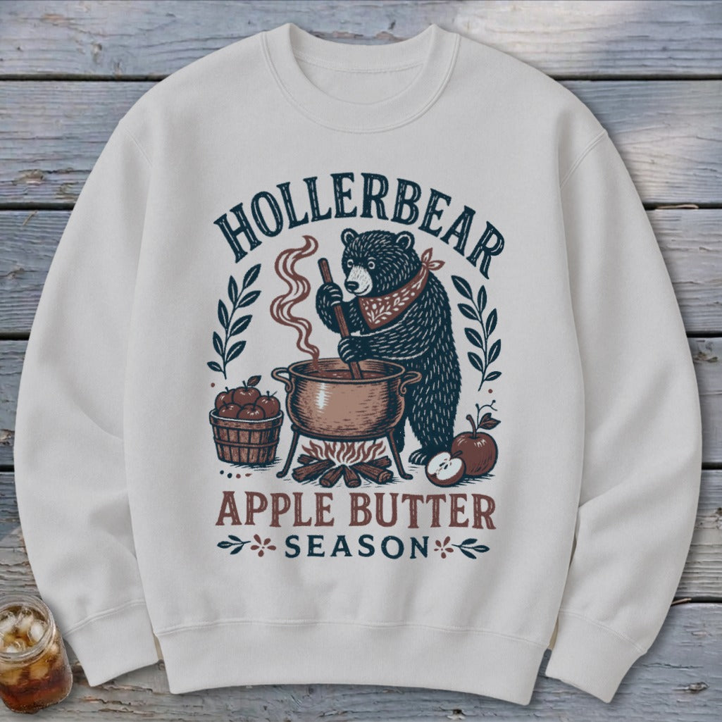 White sweatshirt with Hollerbear Apple Butter Season graphic featuring a bear stirring a pot.