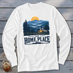 White long-sleeve shirt with graphic of a house, mountains, and text "The Home Place".