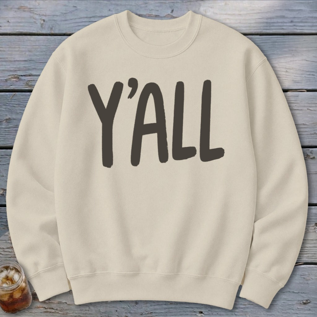 Cream crewneck sweatshirt with "Y'ALL" printed in dark grey.