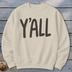 Cream crewneck sweatshirt with "Y'ALL" printed in dark grey.