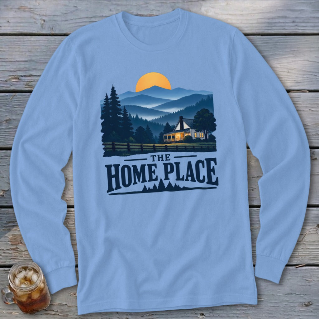 Light blue long sleeve shirt with a mountain scene and "The Home Place" text.