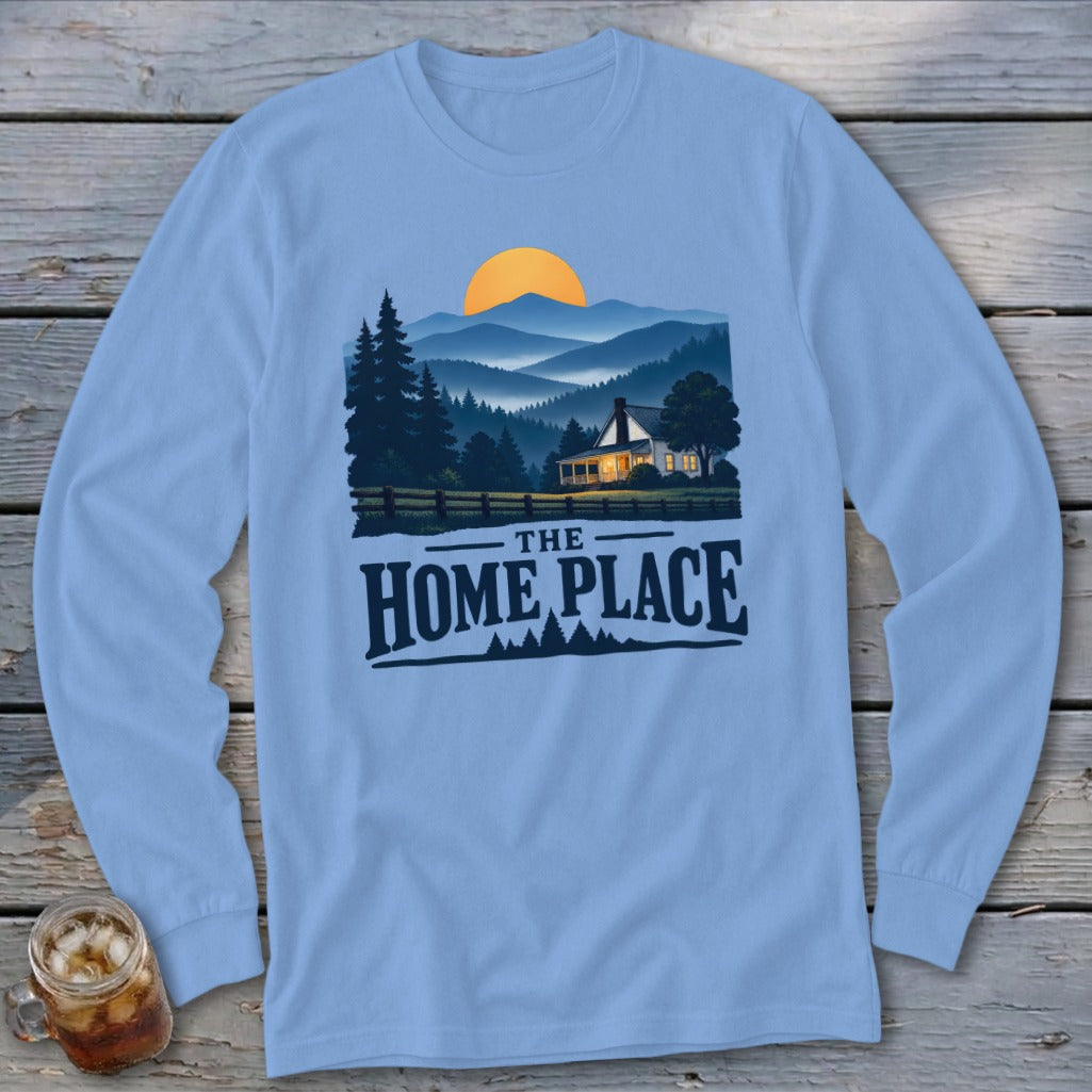 Light blue long sleeve shirt with a mountain scene and "The Home Place" text.