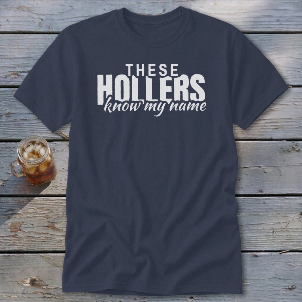 Navy t-shirt with white text "THESE HOLLERS know my name".