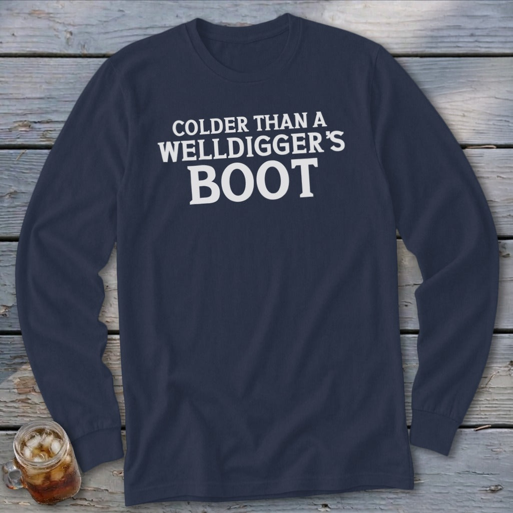Navy long-sleeve shirt with white text reading "Colder Than A Welldigger's Boot".