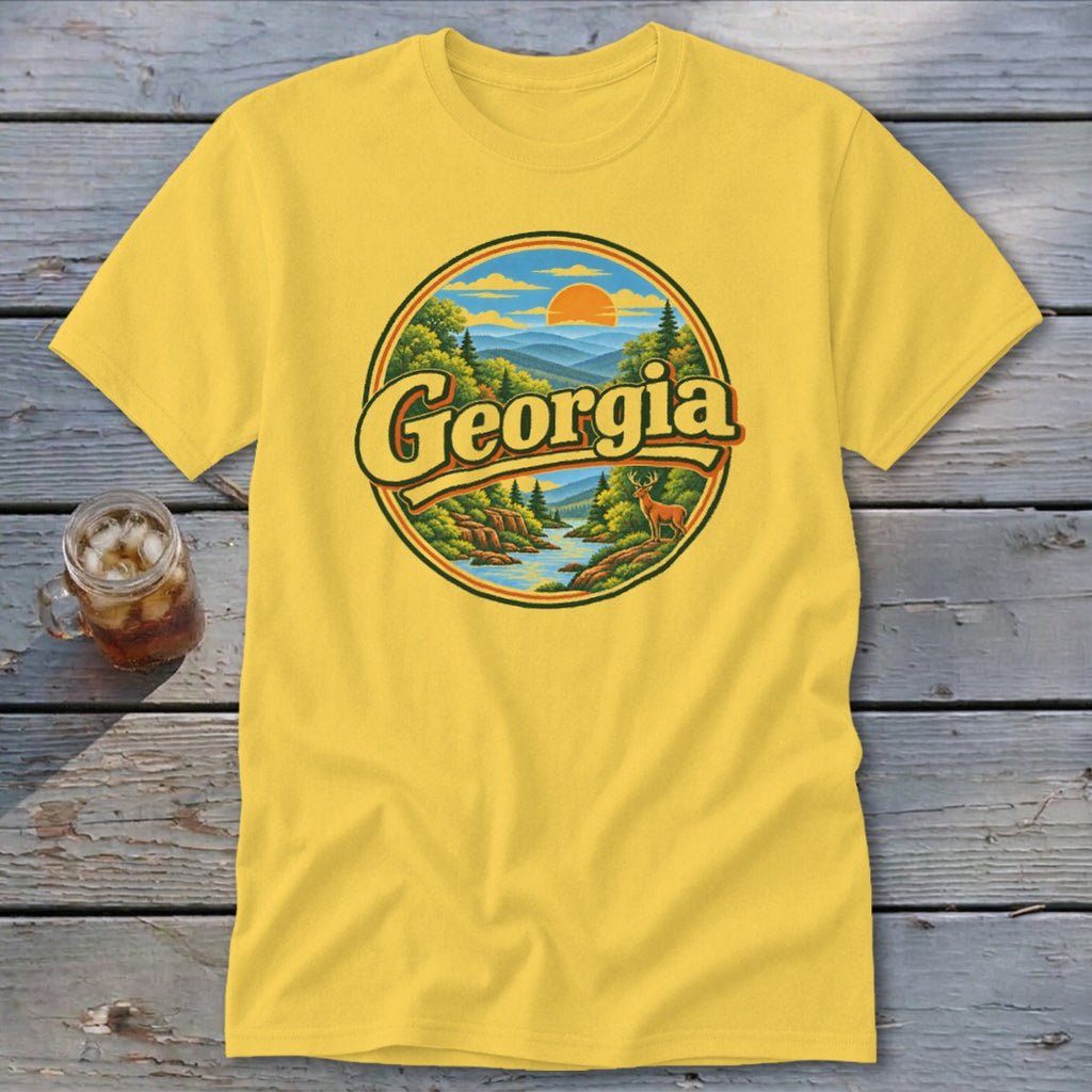 Yellow t-shirt with circular Georgia mountain landscape graphic and deer.
