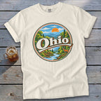 Cream t-shirt with circular Ohio landscape graphic featuring mountains, river, and deer.
