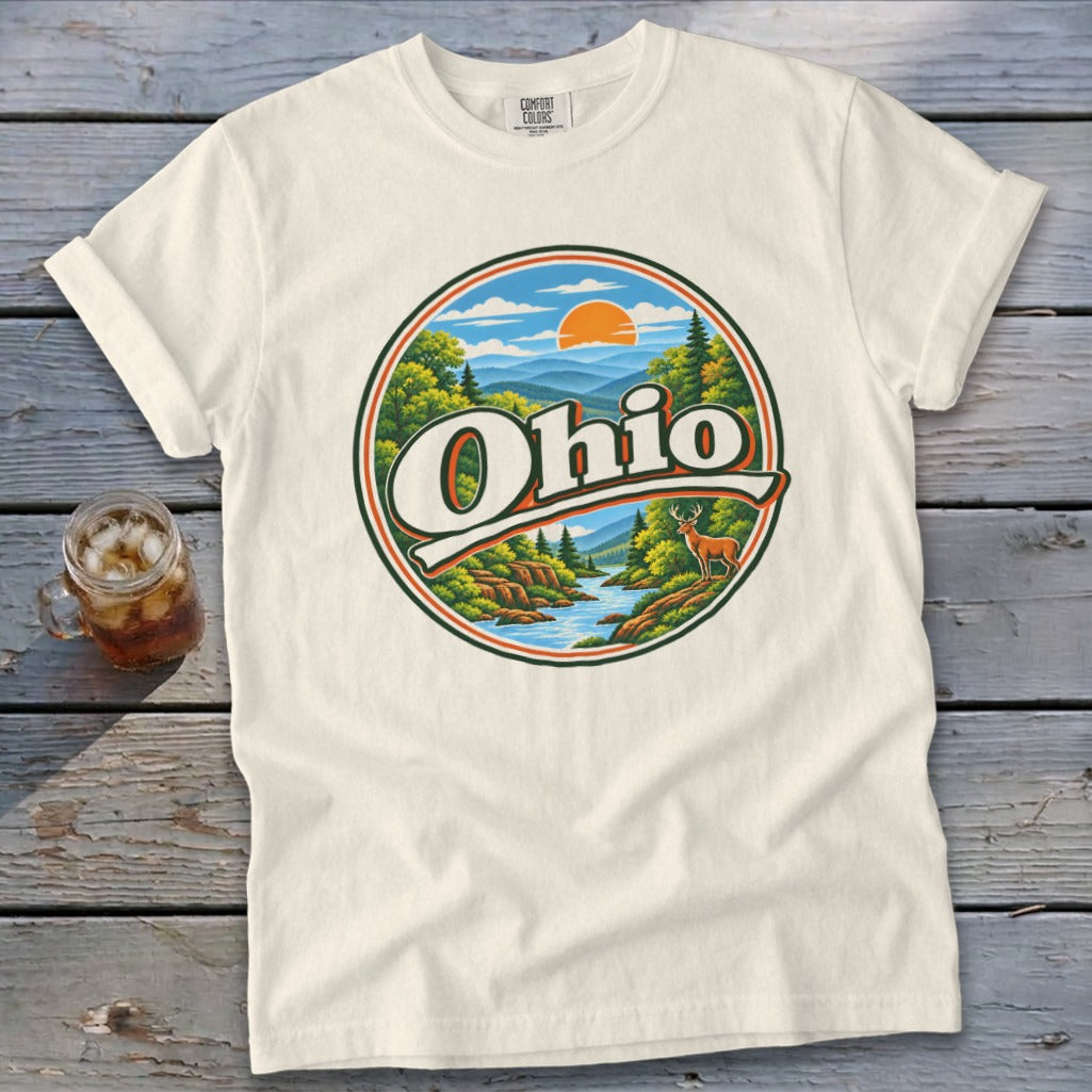 Cream t-shirt with circular Ohio landscape graphic featuring mountains, river, and deer.