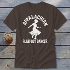 Brown t-shirt featuring a white graphic of a dancer with Appalachian Flatfoot Dancer text.