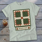 Light green t-shirt with a quilt design and "BEAR'S PAW" text.