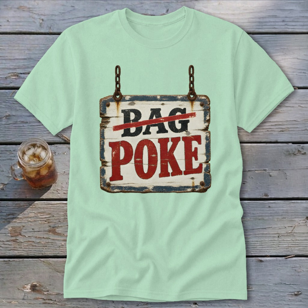 Light green t-shirt featuring a hanging wooden sign graphic with crossed-out text reading Bag Poke.