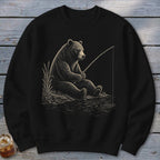 Black sweatshirt with distressed illustration of a bear fishing by reeds.