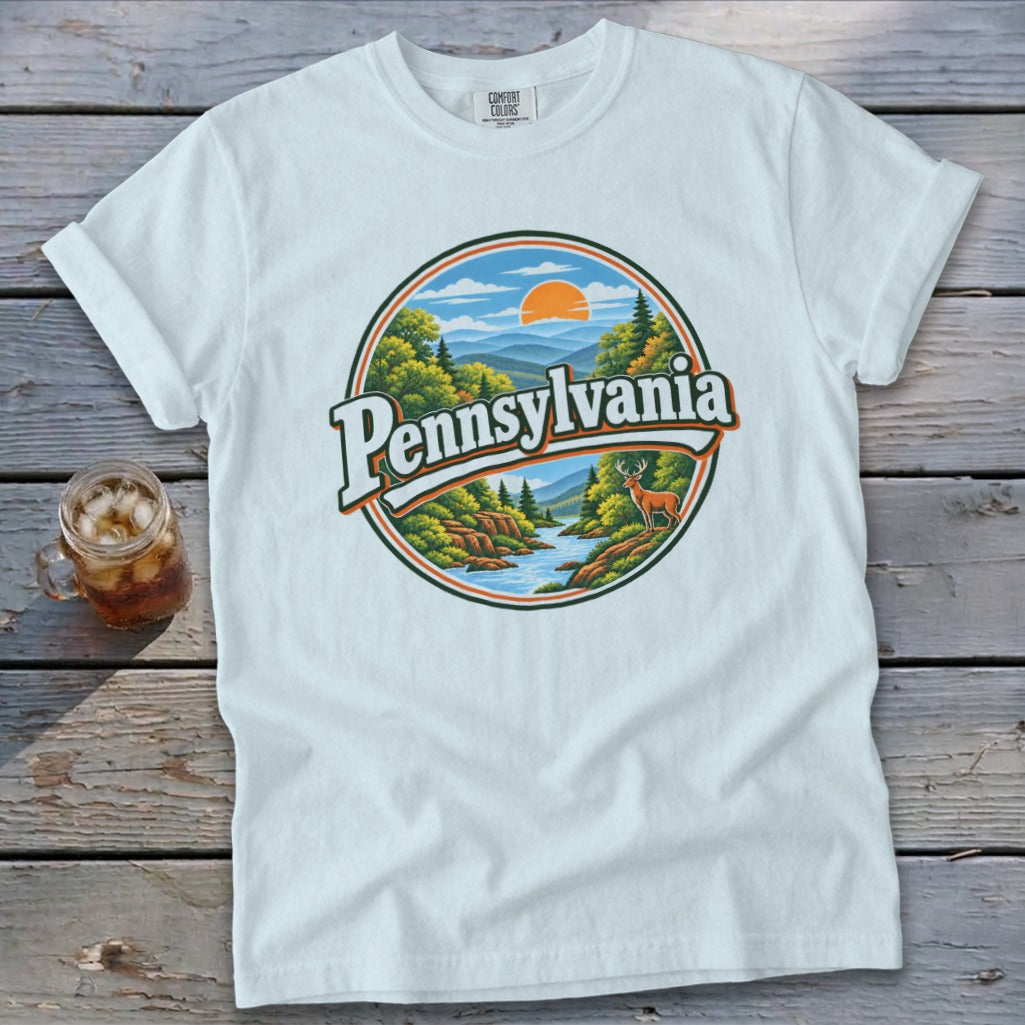 White t-shirt featuring a circular graphic with "Pennsylvania" and a scenic landscape.