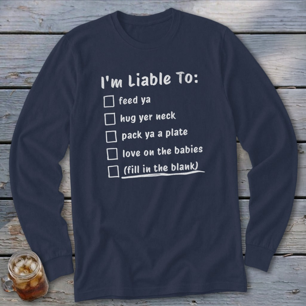 Navy long-sleeve shirt with text "I'm Liable To:" and a checklist.