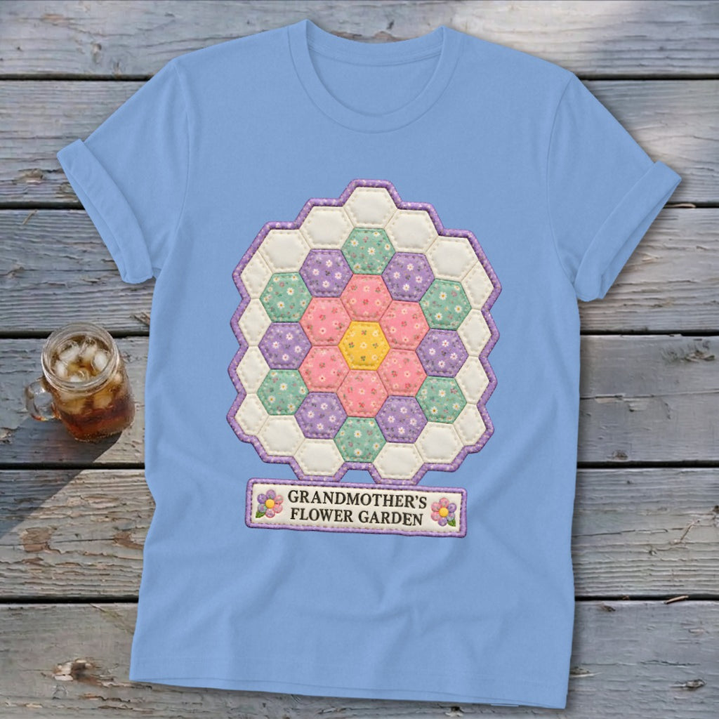 Light blue t-shirt with a hexagon quilt flower design and "Grandmother's Flower Garden" text.