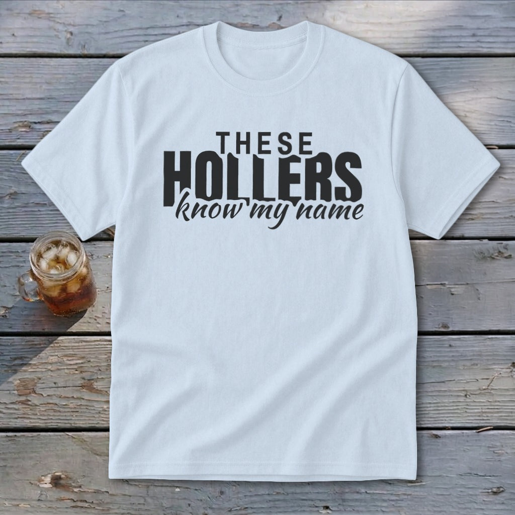 White t-shirt with black text reading "THESE HOLLERS know my name."