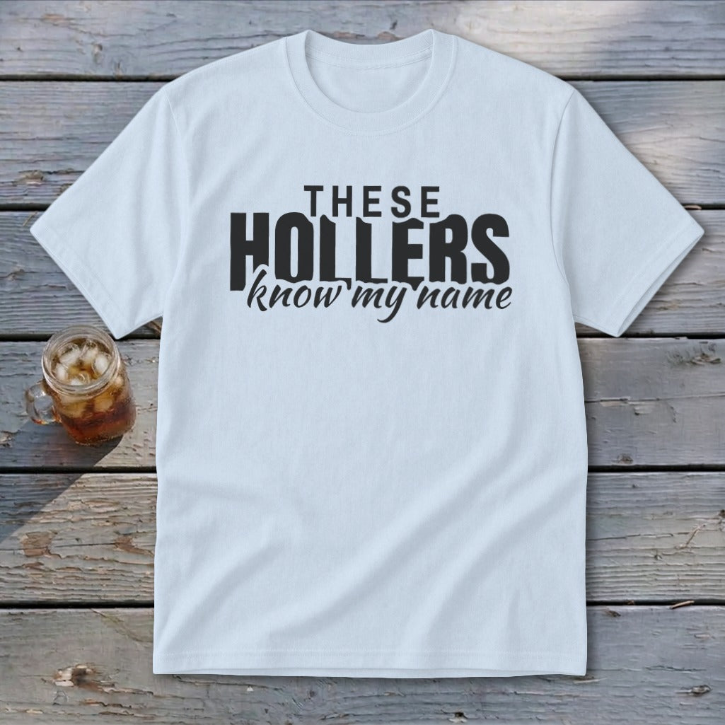 White t-shirt with black text reading "THESE HOLLERS know my name."