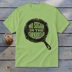 Light green t-shirt with skillet graphic reading "No Sugar in the Cornbread".