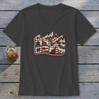 Charcoal v-neck t-shirt featuring a stylized graphic of mountains, trees, and a quilt design in red, white, and black.