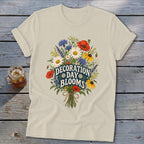 Light-colored t-shirt with a bouquet of flowers and text "DECORATION DAY BLOOMS".