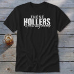 Black t-shirt with white text "THESE HOLLERS know my name".