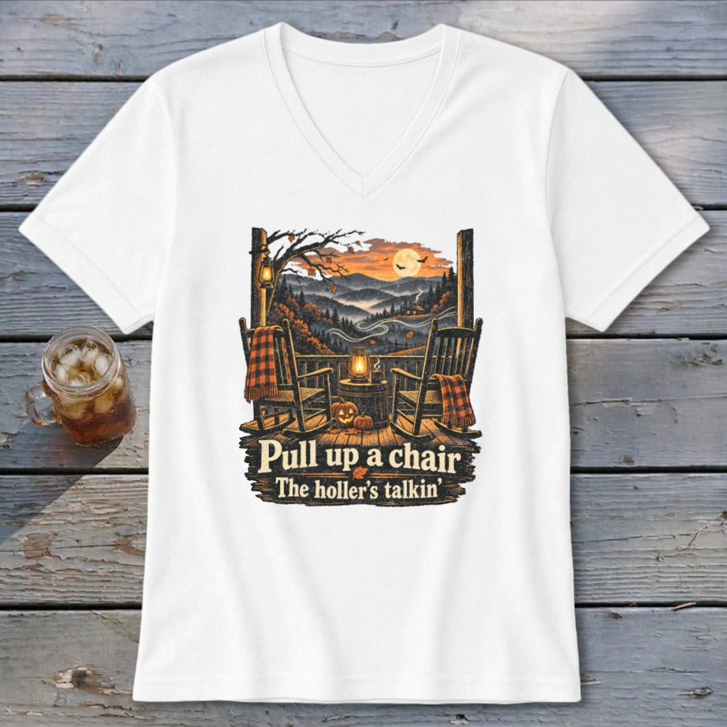 White t-shirt with "Pull up a chair" and "The holler's talkin'" text.