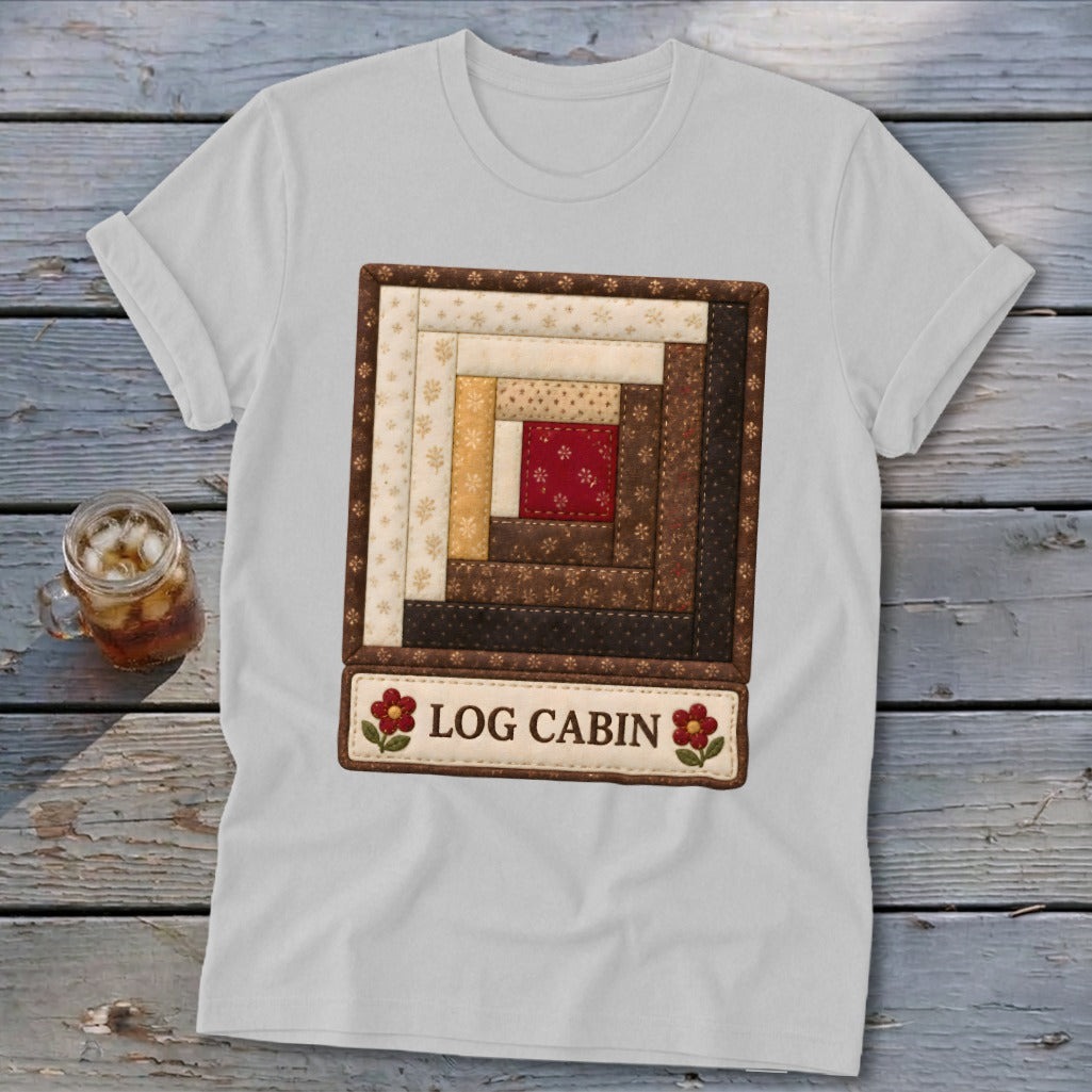 White t-shirt with a quilted log cabin pattern and "LOG CABIN" text.