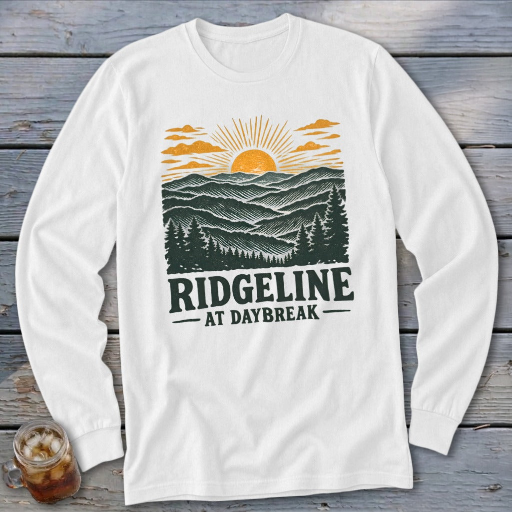 White long sleeve shirt with a "Ridgeline at Daybreak" graphic of mountains and sunrise.
