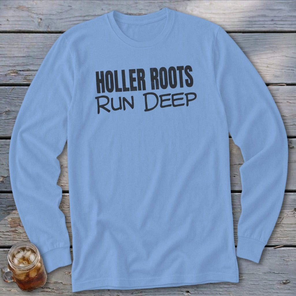 Light blue long-sleeve shirt with "HOLLER ROOTS RUN DEEP" text.