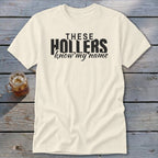 Cream t-shirt with black text that reads "THESE HOLLERS know my name".