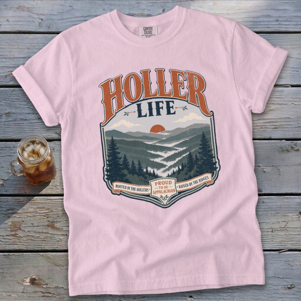 Pink t-shirt with "Holler Life" mountain graphic and text.