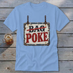 Light blue t-shirt featuring a hanging wooden sign graphic with text reading Bag Poke.