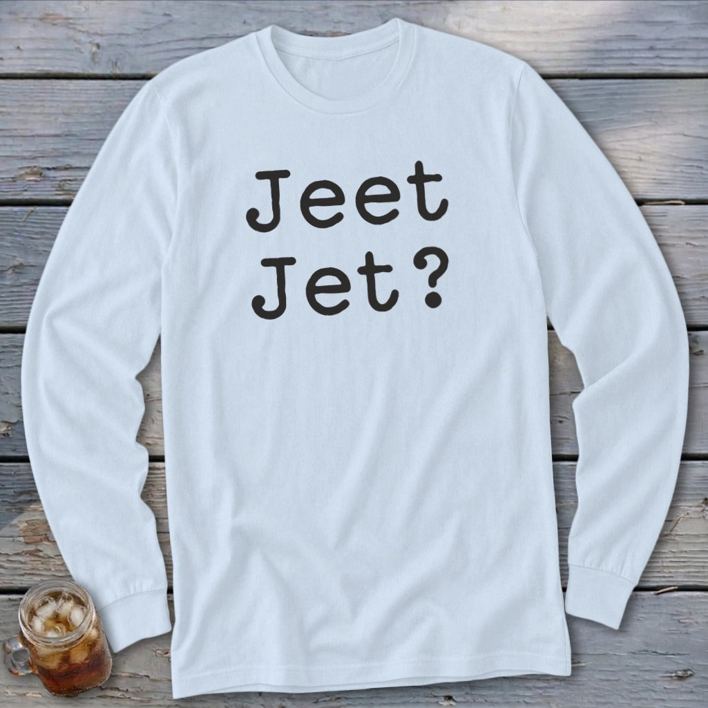 Light blue long-sleeve shirt with black text "Jeet Jet?".