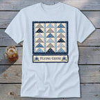 Light blue t-shirt with a "Flying Geese" quilt block design and text.