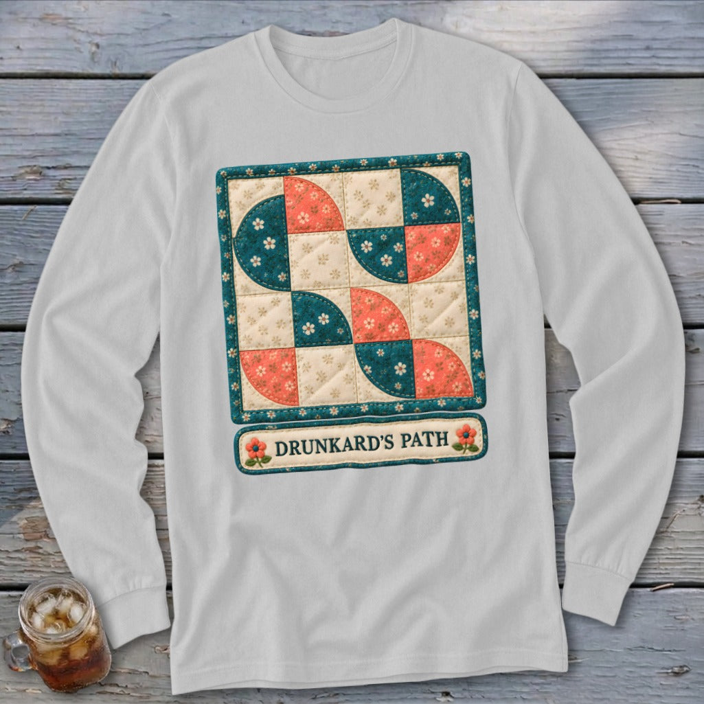 Long-sleeve shirt with a "Drunkard's Path" quilt block design.