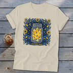 Cream t-shirt with a jar filled with lightning bugs and the text "Lightning Bugs".