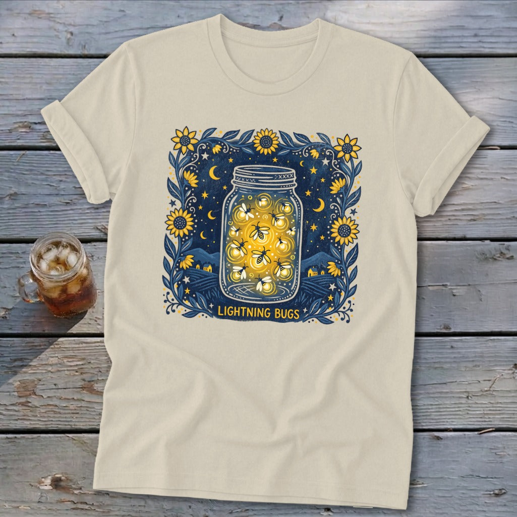Cream t-shirt with a jar filled with lightning bugs and the text "Lightning Bugs".