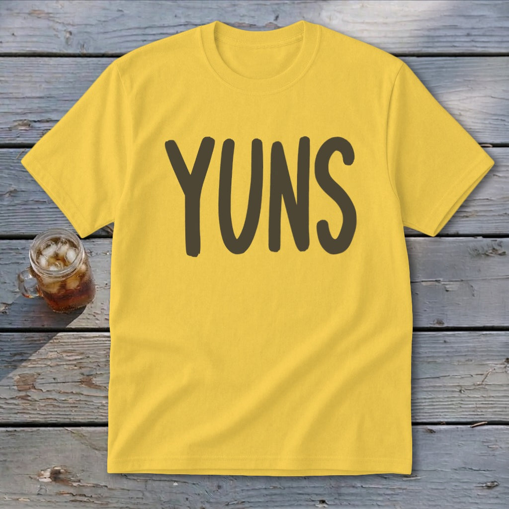Yellow t-shirt with dark brown text "YUNS" centered on the chest.