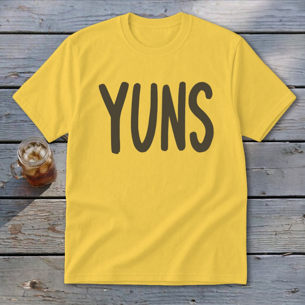 Yellow t-shirt with dark brown text "YUNS" centered on the chest.