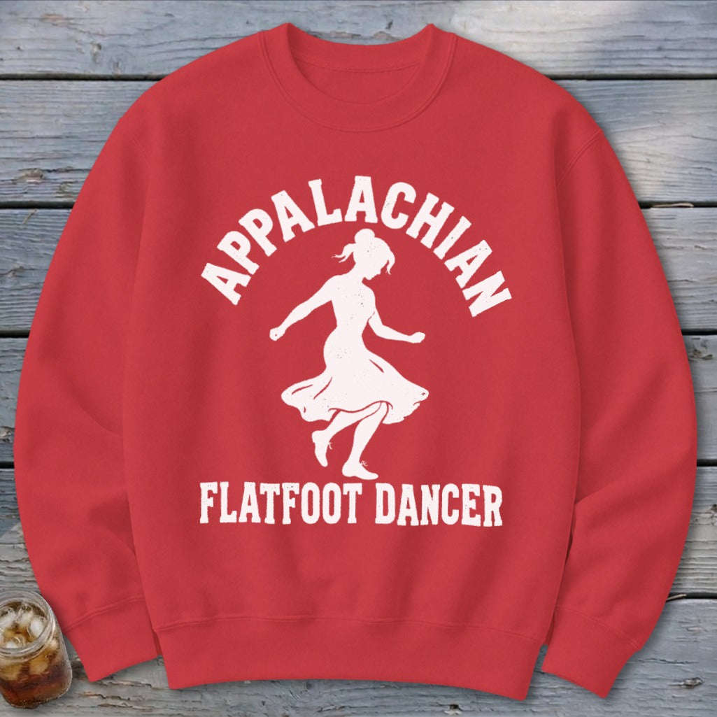 A red crewneck sweatshirt featuring a white graphic of a dancing woman and text reading Appalachian Flatfoot Dancer.