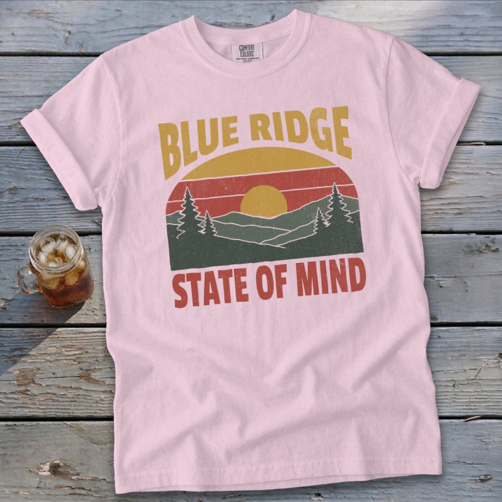 Light pink t-shirt with "Blue Ridge State of Mind" and mountain sunset graphic.