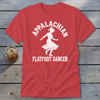 Red short-sleeved t-shirt with a white graphic of a female dancer and the text Appalachian Flatfoot Dancer.