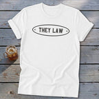 White t-shirt with oval graphic text: THEY LAW