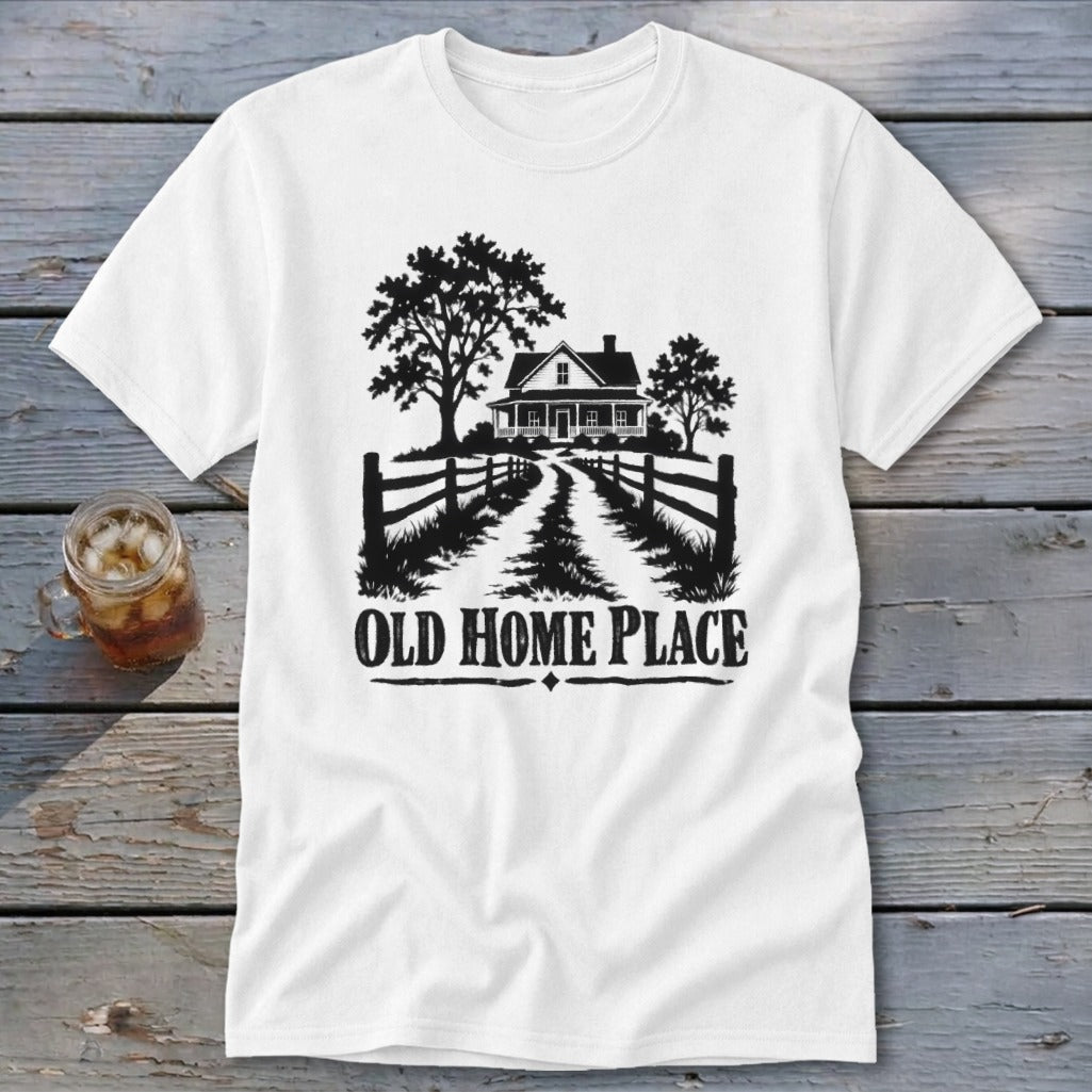 White t-shirt with black graphic of a farmhouse, trees, fence, and text "OLD HOME PLACE".